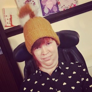 Selfie on me with red hair and wearing a yellow wooly hat