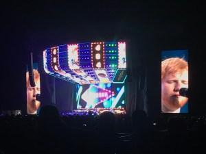 The stage is flashing and brightly coloured. 