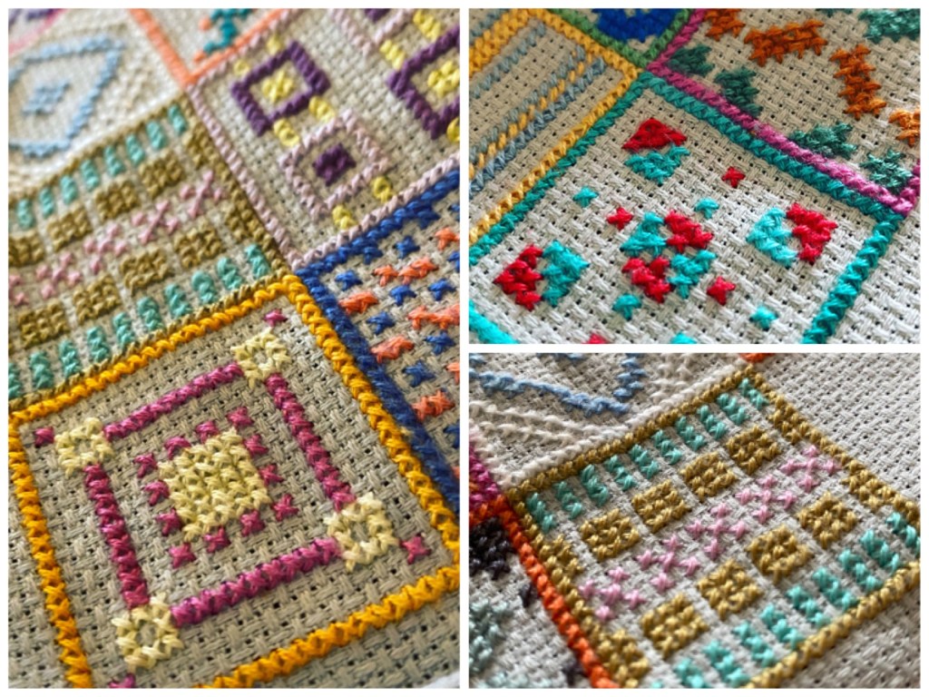 Close up of three cross stitch designs. They are geometric and symmetrical repeat patterns in contrasting bright colours. 