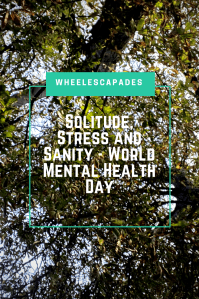 Title text - Solitude, Stress and Sanity - World Mental Health Day, is placed over a photo looking up in to the trees. 