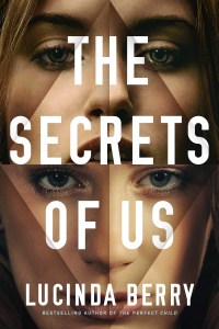 The Secrets of Us book cover. Two ladies faces are shattered into geometric shapes. The title text is large and white, placed over the faces. 
